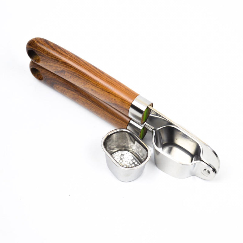 Garlic squeezer - zeests.com - Best place for furniture, home decor and all you need